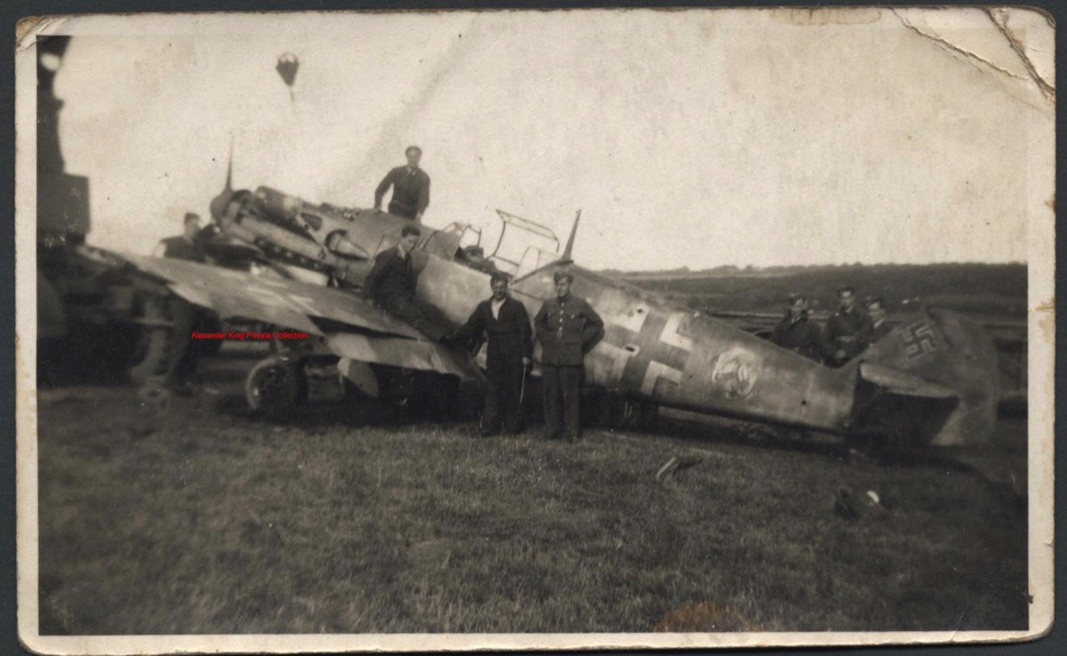 Messerschmitt Bf 109E-3 Wnr.1162 being dismantled at Bladbean Hill (via Alexander D King)