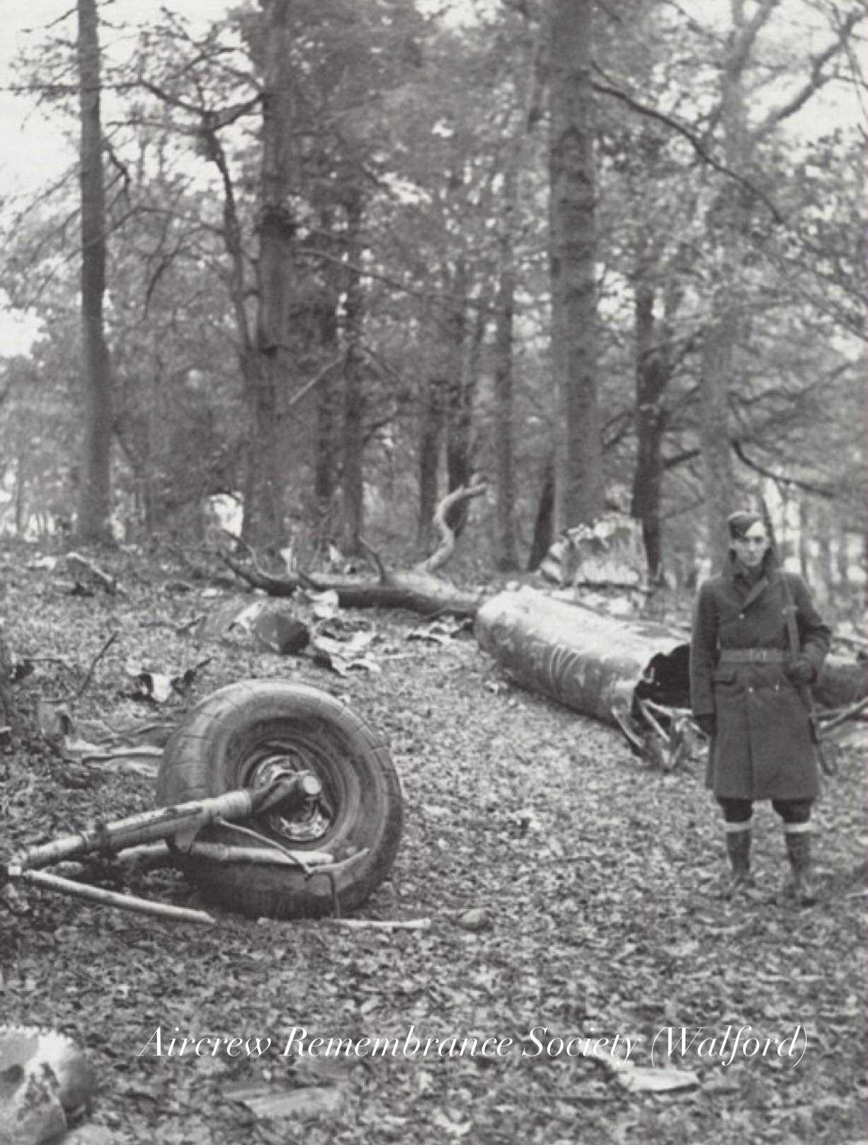 The wreckage of Gunther Seelhorst’s Do 17Z under guard in the woodland (Walford).
