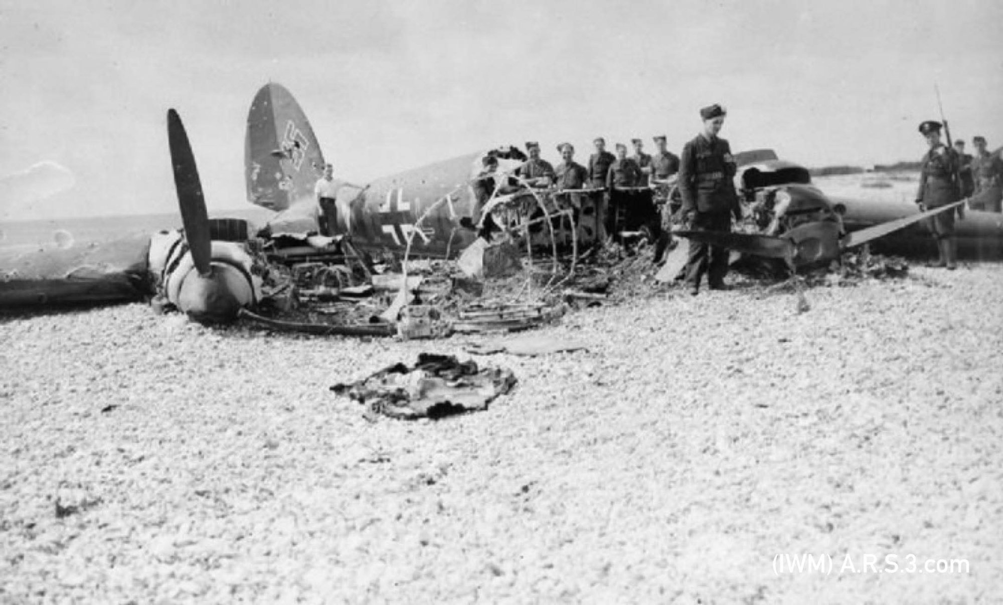 The wreck of Siegfried Schweinhagen's He 111 at East Beach, Selsey. (IWM)