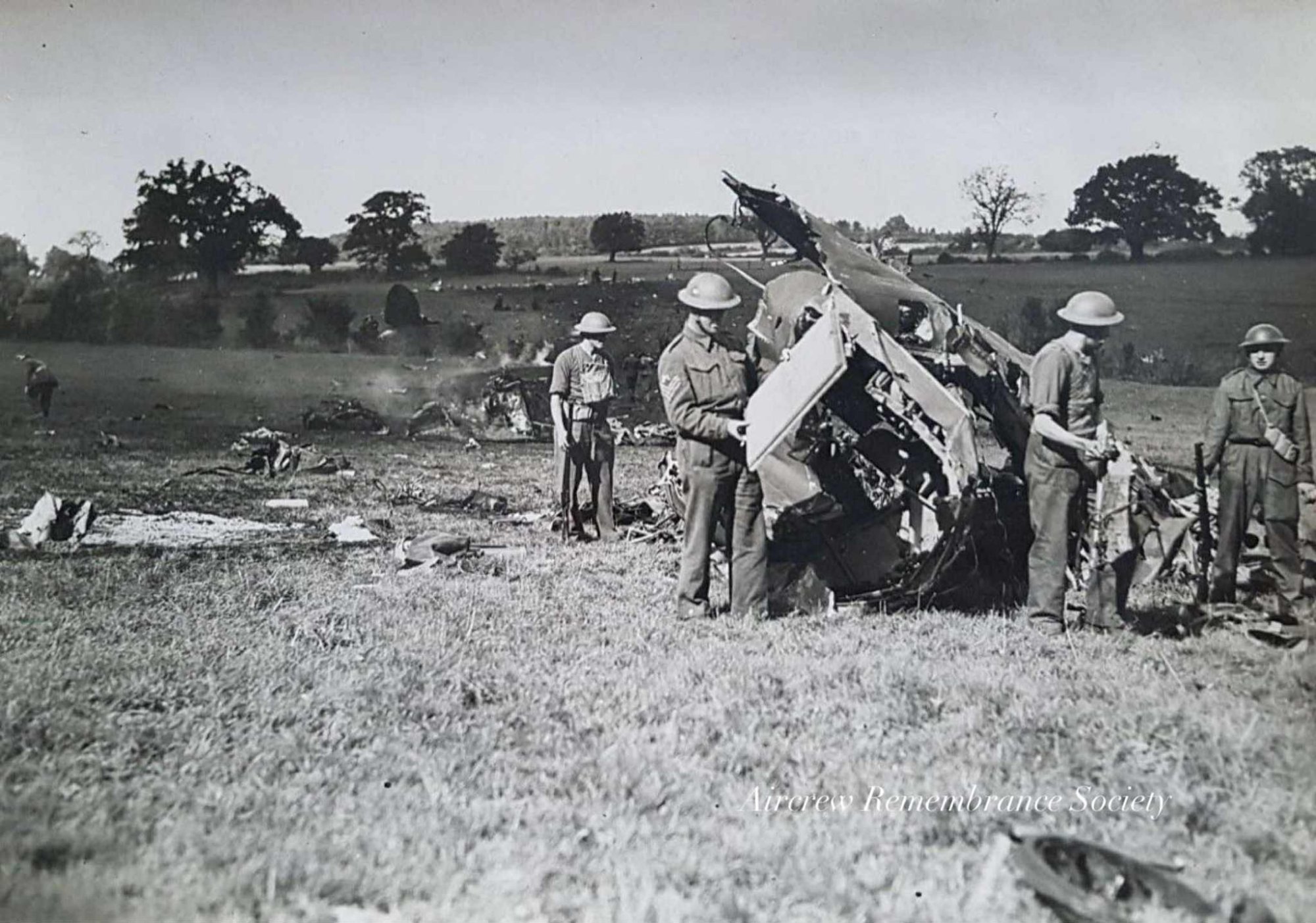 A view of the wreckage of 5./KG55 Heinkel He 111P Wnr.2126  spread over a large area.
