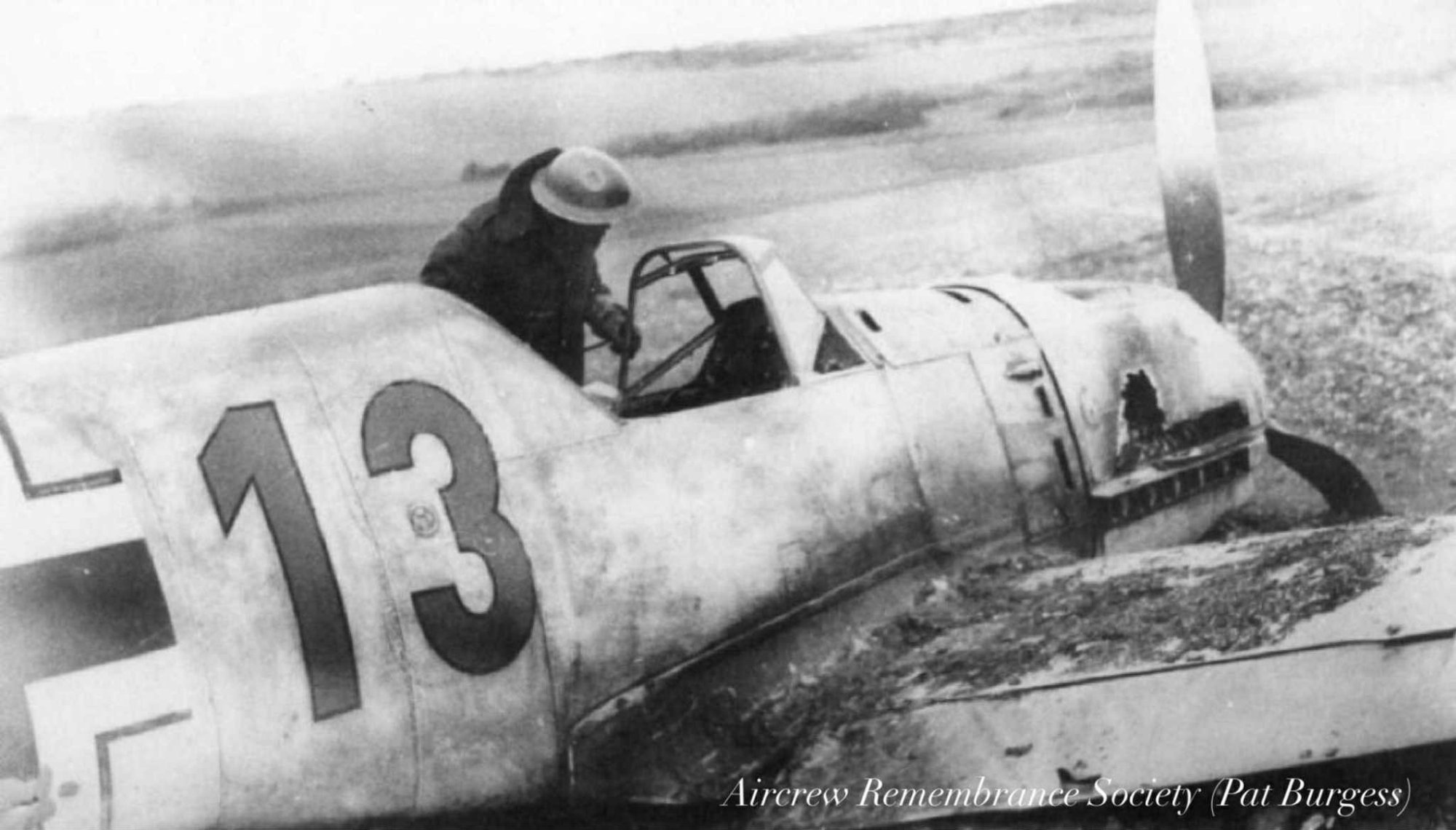 Close inspection of the cockpit of “Red” 13 Messerschmitt Bf 109E-3 Wnr.5104 (Pat Burgess Collection)