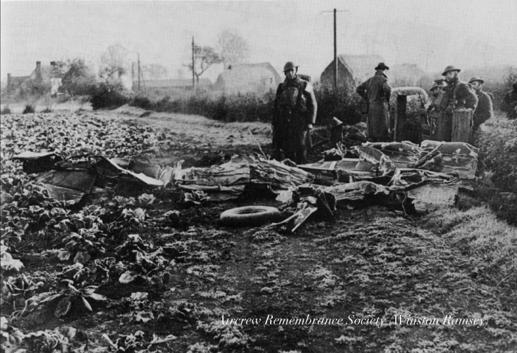 1940 photo of crash site: This photograph was taken at the time of Fw Rank’s crash and shows much of the light airframe on the surface (reproduced with permission from Winston Ramsey).