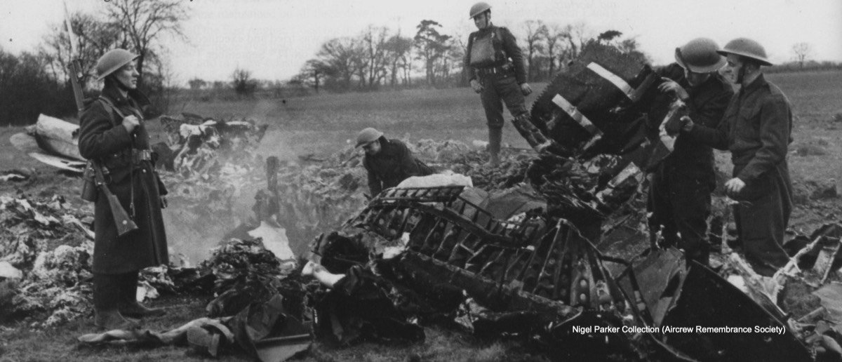 The scene of the crash pictured shortly after impact, smoke still rising from the crater, aircraft destroyed. (Nigel Parker).