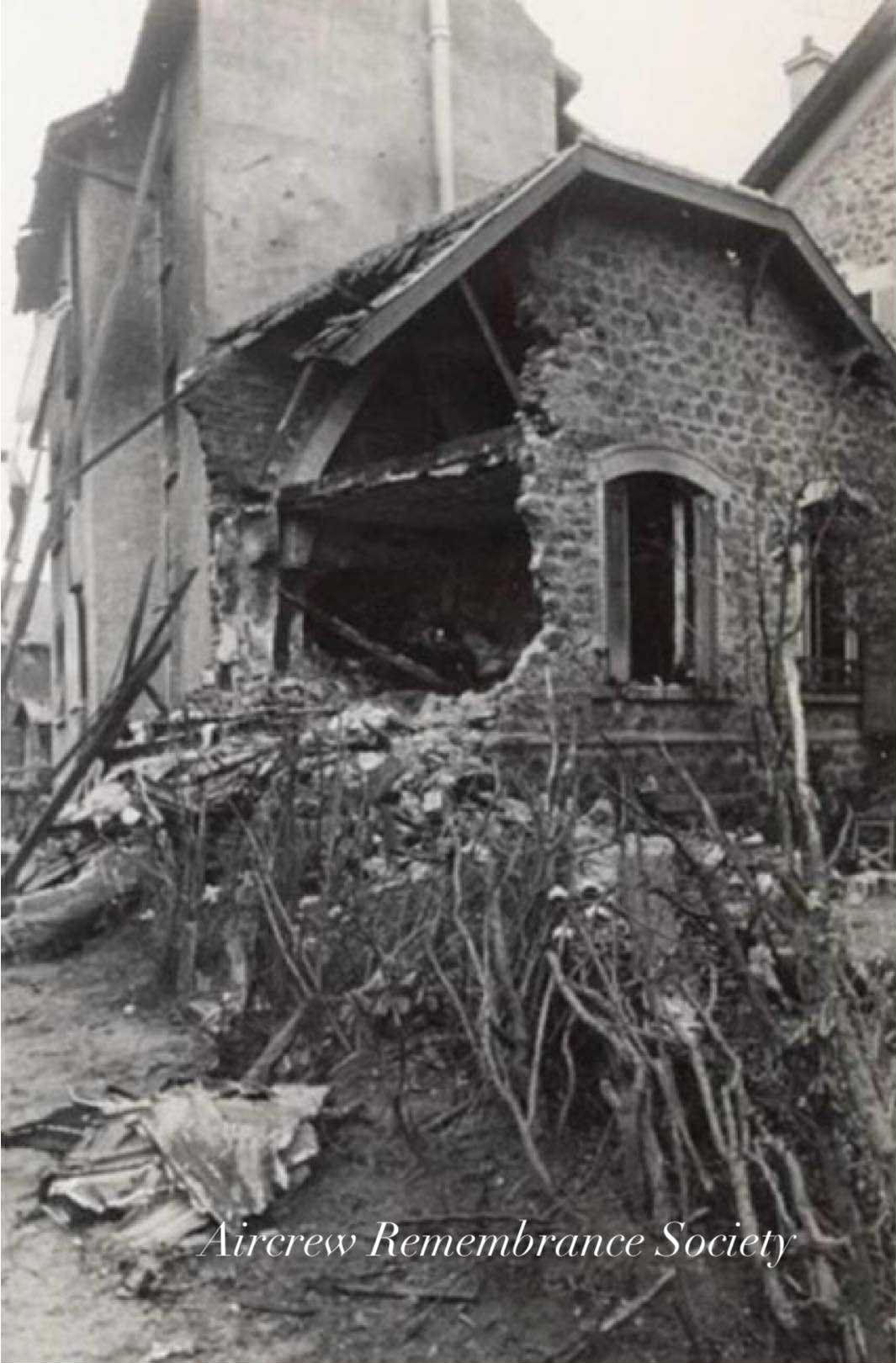 Damaged property along the street.