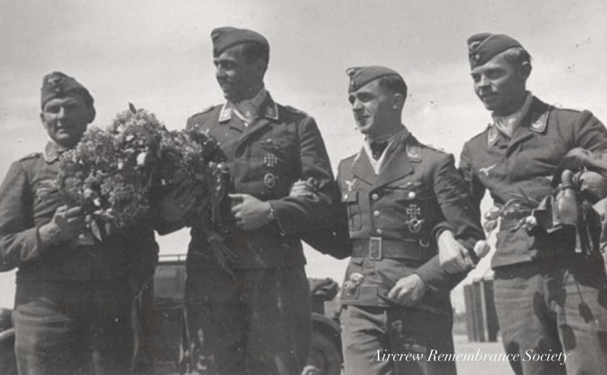 03.05.42 Reiser, Hund, Berndt & Störmer after return from enemy war flight,
having been attacked by two aircraft and suffered many hits managed to get back safely.