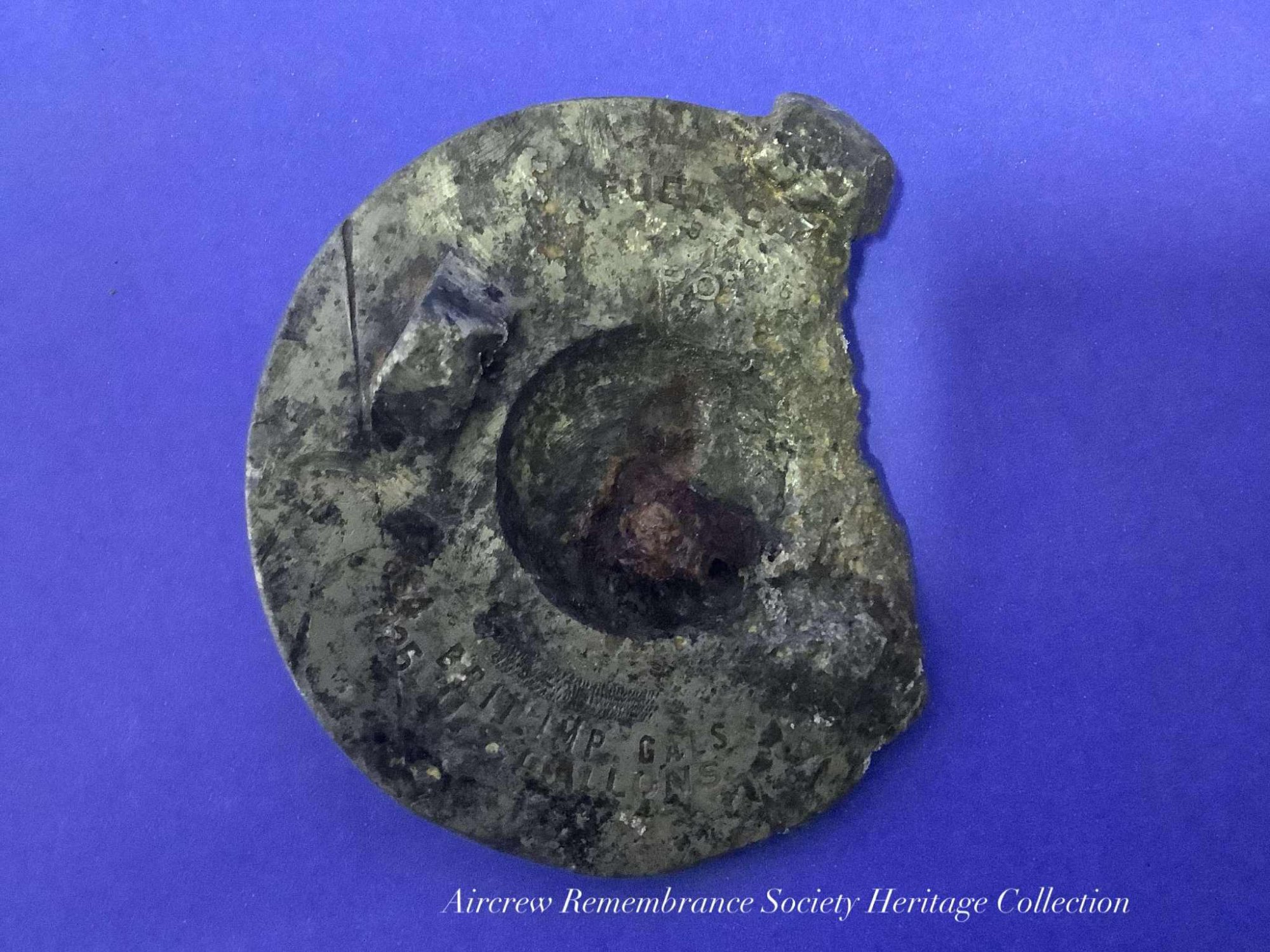 Fuel cap recovered from the crash site of Boeing B-17G Flying Fortress 42-31469