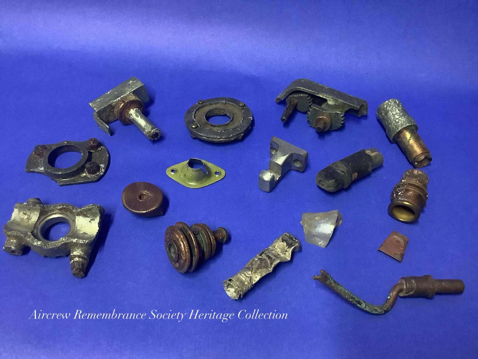 Various artefacts recovered from the crash site of Boeing B-17G Flying Fortress 42-31469