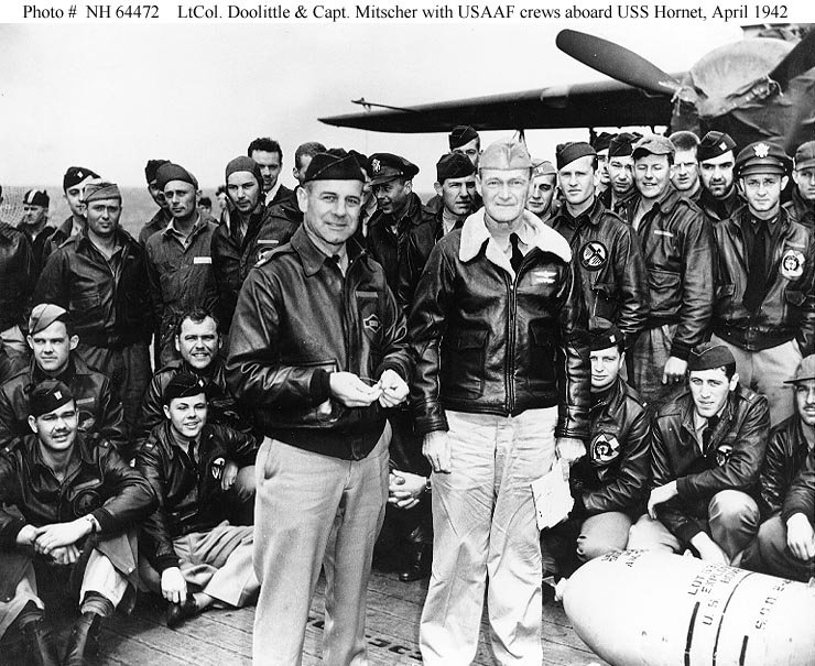 LtCol Doolittle & Capt Mitscher withUSAAF crews aboard USS Hornet April 1942.
