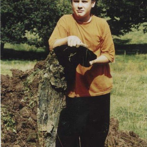 Aircrew Remembrance Society investigated the crash site of FN142 in September 1998. Alexander King holding propeller blade from FN142.