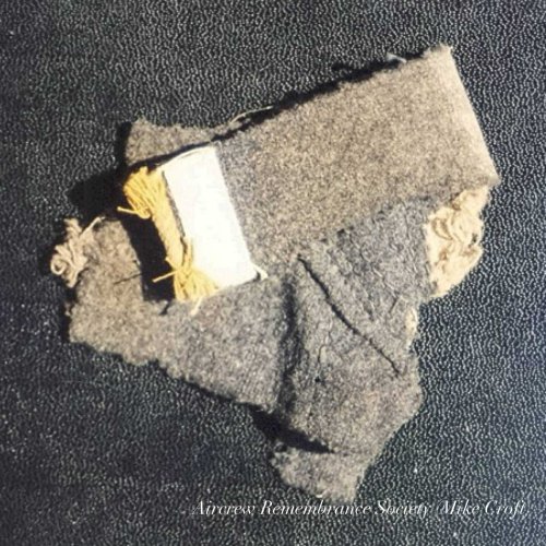Piece of Luftwaffe uniform collar picked up at time of crash
now in the Mike Croft collection.