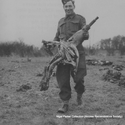 Soldiers inspect various armament found! (Nigel Parker).