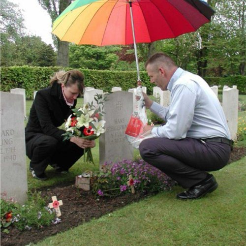 Dunja Steigerwald leaves flowers for her grandfather. Last resting place (Brownless)