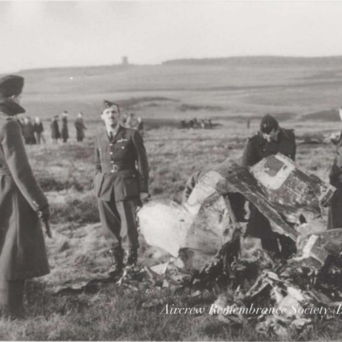 Officers and men of No. 41 Squadron Catterick inspect the wreckage of the ill-fated Junkers Ju 88. The officer standing in centre of the photo could possibly be P/O. Archie Winskill, note that this officer is still wearing his flying boots. (Via Norman)