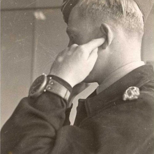 Fritz Schlichting takes a call at command post.