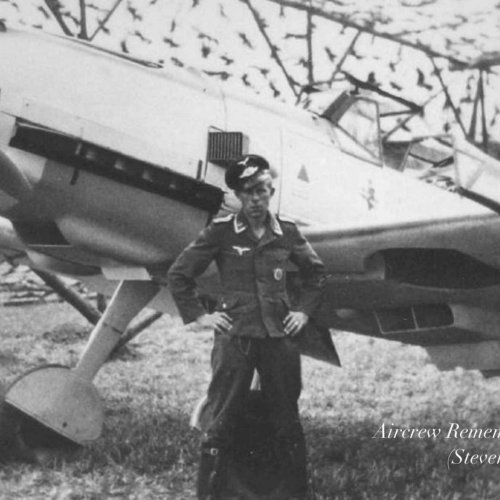Uffz. Boesch pictured with Messerschmitt Bf 109E (Hall).