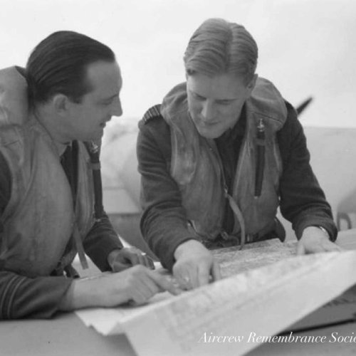 W/C Braham and F/O “Sticks” Gregory pictured a little later in the war with their Mosquito (IWM)