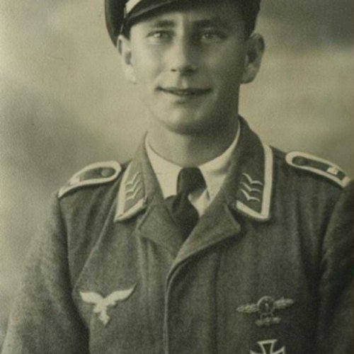 Karl Hager pictured as Uffz wearing German Cross in Gold and gold mission pendant badge (via jeckel)