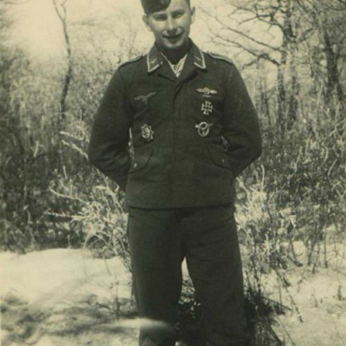 Karl Hager pictured as Uffz wearing German Cross in Gold and gold mission pendant badge (via jeckel)