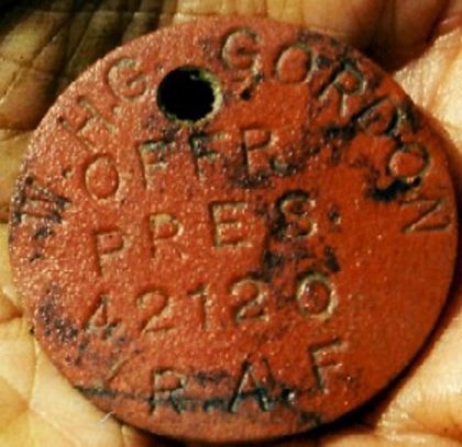 A very poignant and invaluable find P/O Gordon's ID disc confirming identity (via C. Ellis)