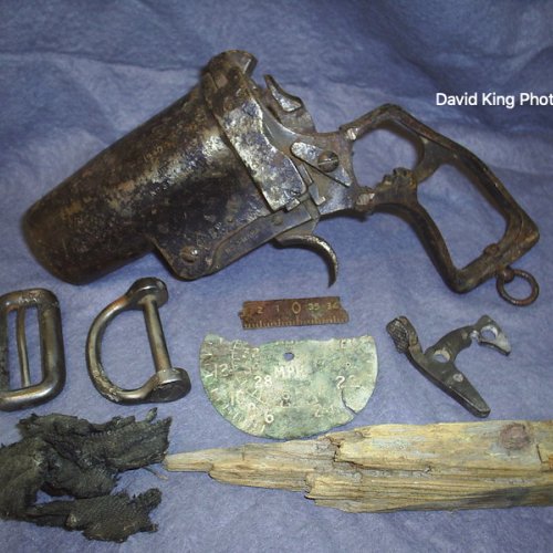 Relics from the recovery of Blenheim R3912 in the Aircrew Remembrance Society Archive Collection, which include Webley & Scott signal pistol held under licence No. 61798 Birmingham Gun Barrel Proof House Deactivation Certificate.
