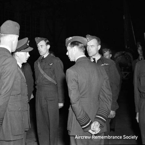 Fl/Lt. Jost (2nd from right) being introduced to King George VI, June 12, 1942. (courtesy National Defence Image Library of Canada PL-7816 UK-1598) (Halifax II JD147)