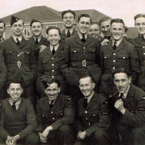 Sgt J. W. Mulford second from left front row,fooling around with other lads during training (Sergio Manente)