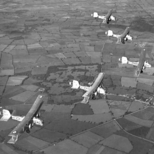 Five Overstrands of 101 Squadron flying over the Buckinghamshire Countryside.