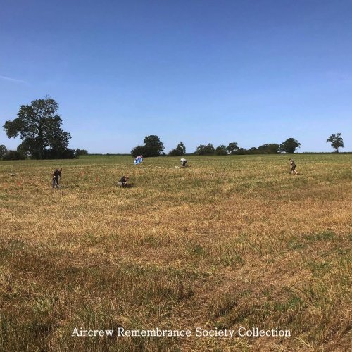 Dig in progress 19th September (left to right) Dave Keen and Tony White working in Grid ref: F7 and David King and Charlie White working in Grid ref: F6, the Royal Airforce flag at the site of the temporary Memorial in the North West corner of grid F7.
