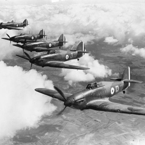 Hurricane Mark Is of No. 73 Squadron RAF, based at Rouvres, France, flying in loose echelon formation. I.W.M.
