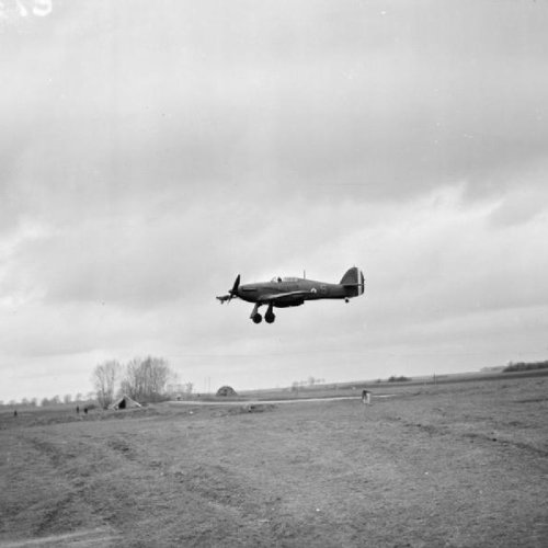 Hawker Hurricane Mark Is of No. 73 Squadron RAF coming in to land at Rouvres. The nearest 'S', is being flown by Pilot Officer P V Ayerst. I.W.M.
