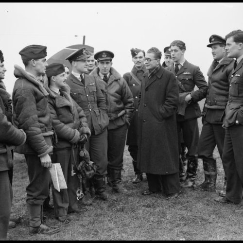 No 73 Squadron entertain a Greek newspaper correspondent at their base at Rouvres, December 1939. I.W.M.