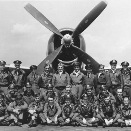Line up of pilots of 61st Fighter Squadron. Appears to be taken about July- August 1944 from the full D-Day stripes on the P-47's wings.

( L to R) Front Row: Lt. George E Levkovich, Lt. Robert A Baughman, Capt. James R Carter, Lt. Stuart H Getz, Lt. Arthur C Maul, Lt. Robert J Rankin, Lt. Earl Hertel, Lt. Cleon C Thornton, Lt. Oscar M Belk, Lt. Joel I Popplewell. Middle Row: Lt. William R Hudson, Lt. Warren S Patterson, Lt. Timothy J Sullivan, Lt. Merton J Gillies, Lt. Jack J Haek, Lt. Praeger Neyland, Lt. Edward A Sisson, Lt. Samuel D Hamilton, Lt. William M Heaton, Lt. Herbert R Holtmeier, Lt. Steven Gerick, Lt. Carl E Westman. Back Row: Lt. Dick W Thompson, Lt. James J Clark, Lt. William H Barnes, Capt. Benjamin E Cathers, S/Ldr. Tadeusz Sawicz, Flt/Lt. Tadeusz Andersz, Lt.Col. Francis S Gabreski, Flt/Lt. Boleslaw M Gladych, S/Ldr. Kazimierz Rutkowski, Flt/Lt. Witold A Lanowski, Lt. Robert J Keen, Lt. James M Jure, Lt. Joseph H Perry, Lt. William R Aggers. Identification thanks to Piotr Wisniewski. Photo: Glenda Carelas.
